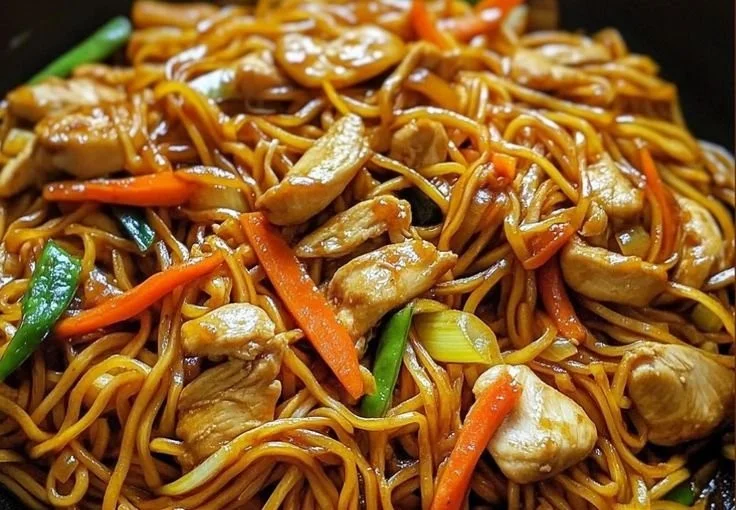 Delicious Chicken Lo Mein with colorful vegetables and noodles